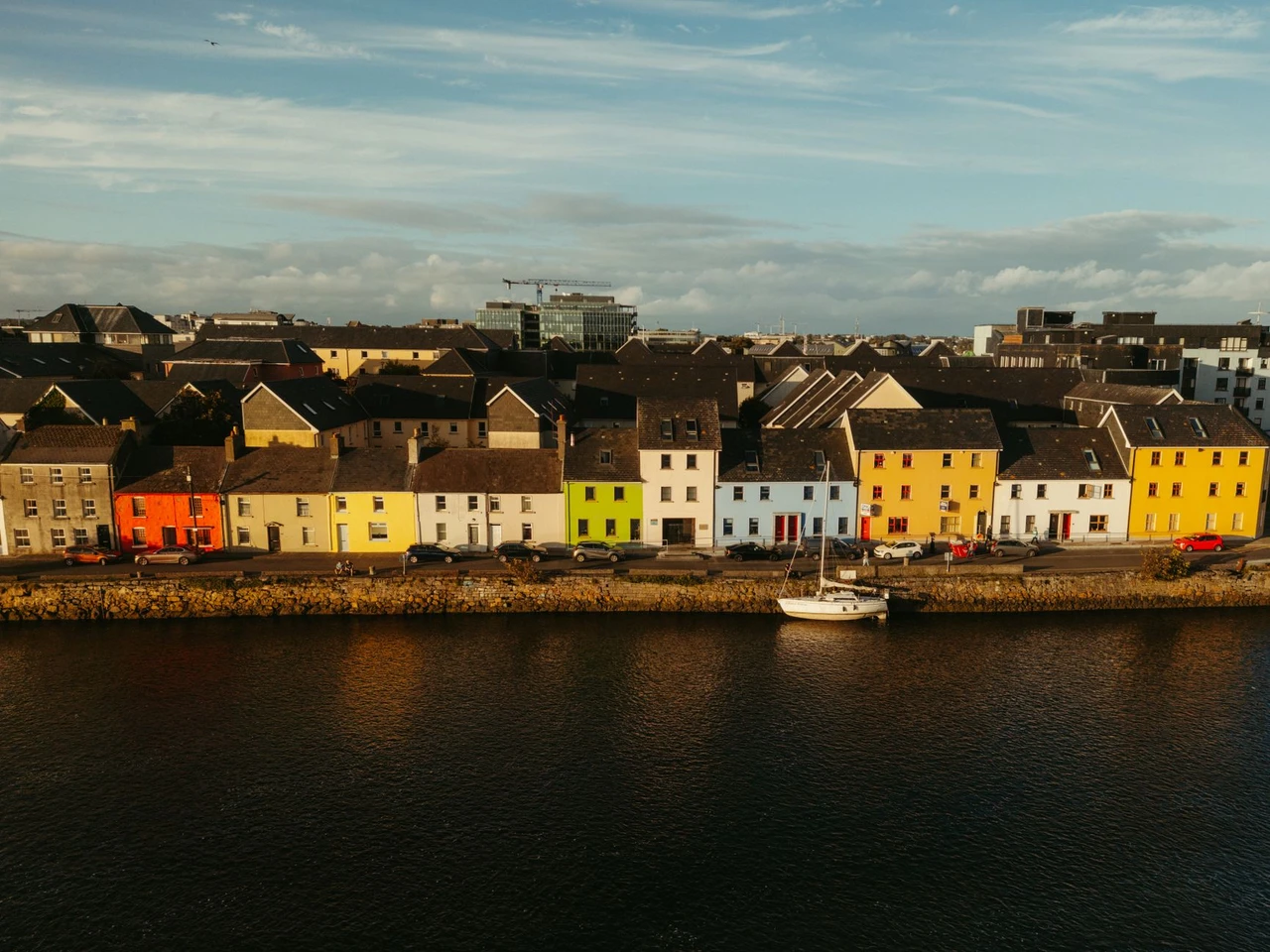 Aerial view of colorful houses along the River Corrib in Galway City, Ireland